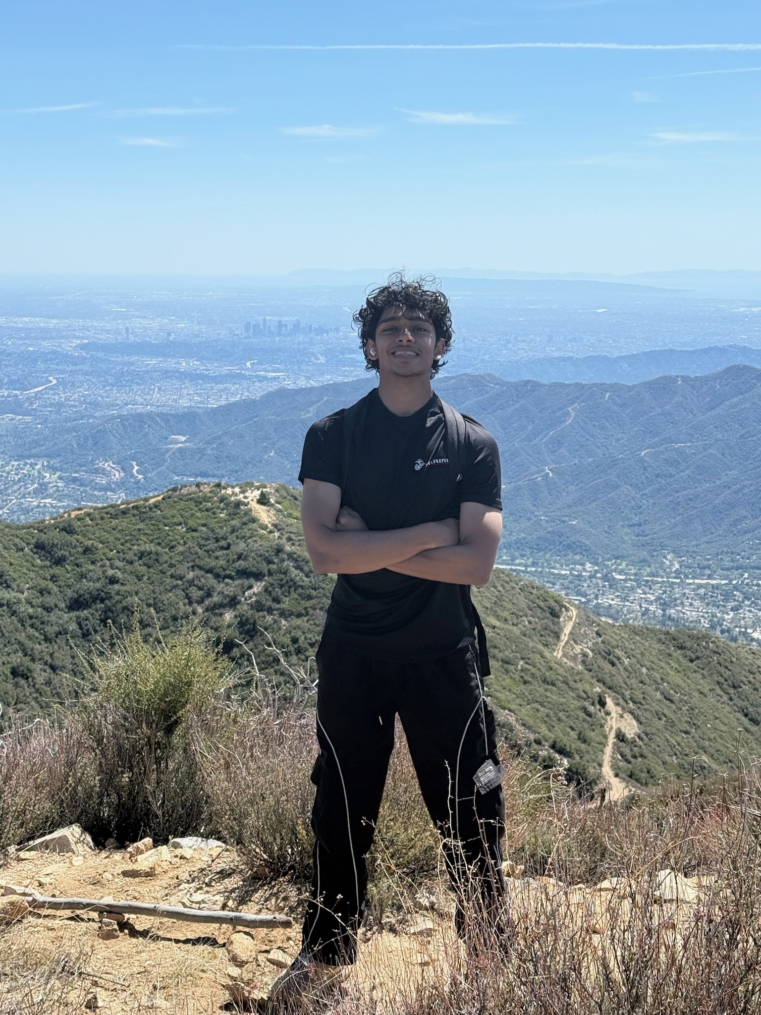 Ashar Huda on a mountain overlook